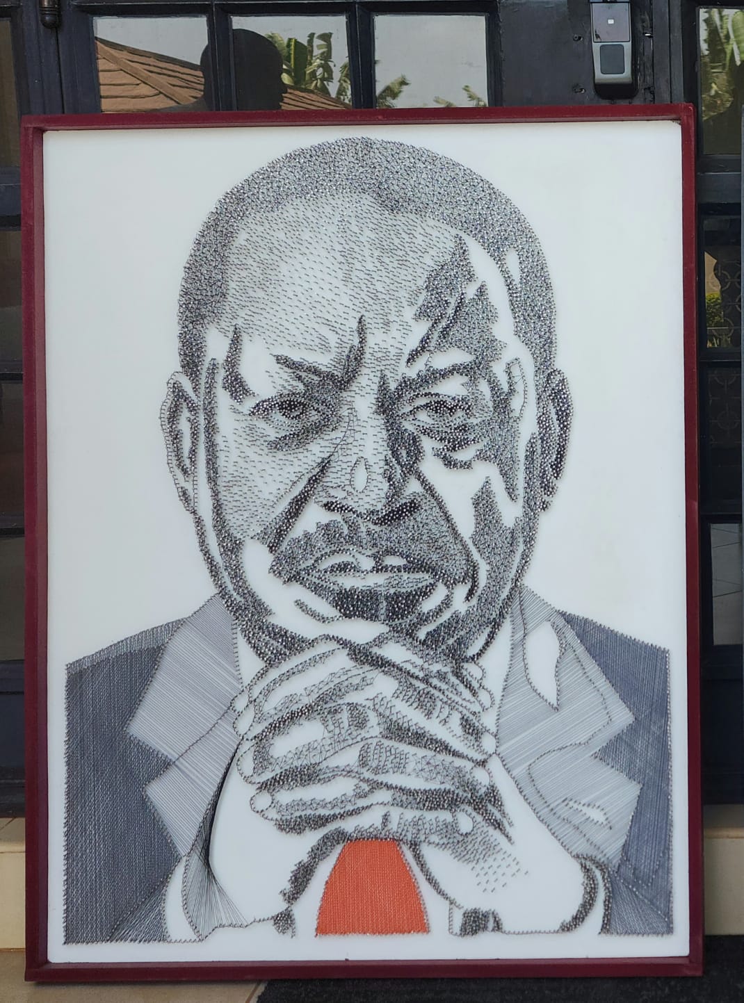 Geometric nail and string portrait of the late Rt. Hon. Raila Amollo Odinga, CGH
